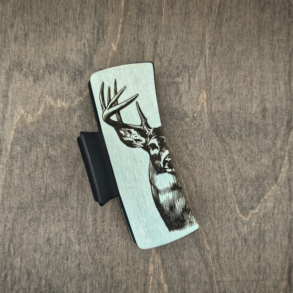 Hand-painted wood hair claw clip featuring a laser-engraved white-tail deer buck portrait on a blue-stained wood background