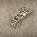 Hand-stained wood hair claw clip featuring a laser-engraved western daffodil with intricate scrollwork on a natural wood background