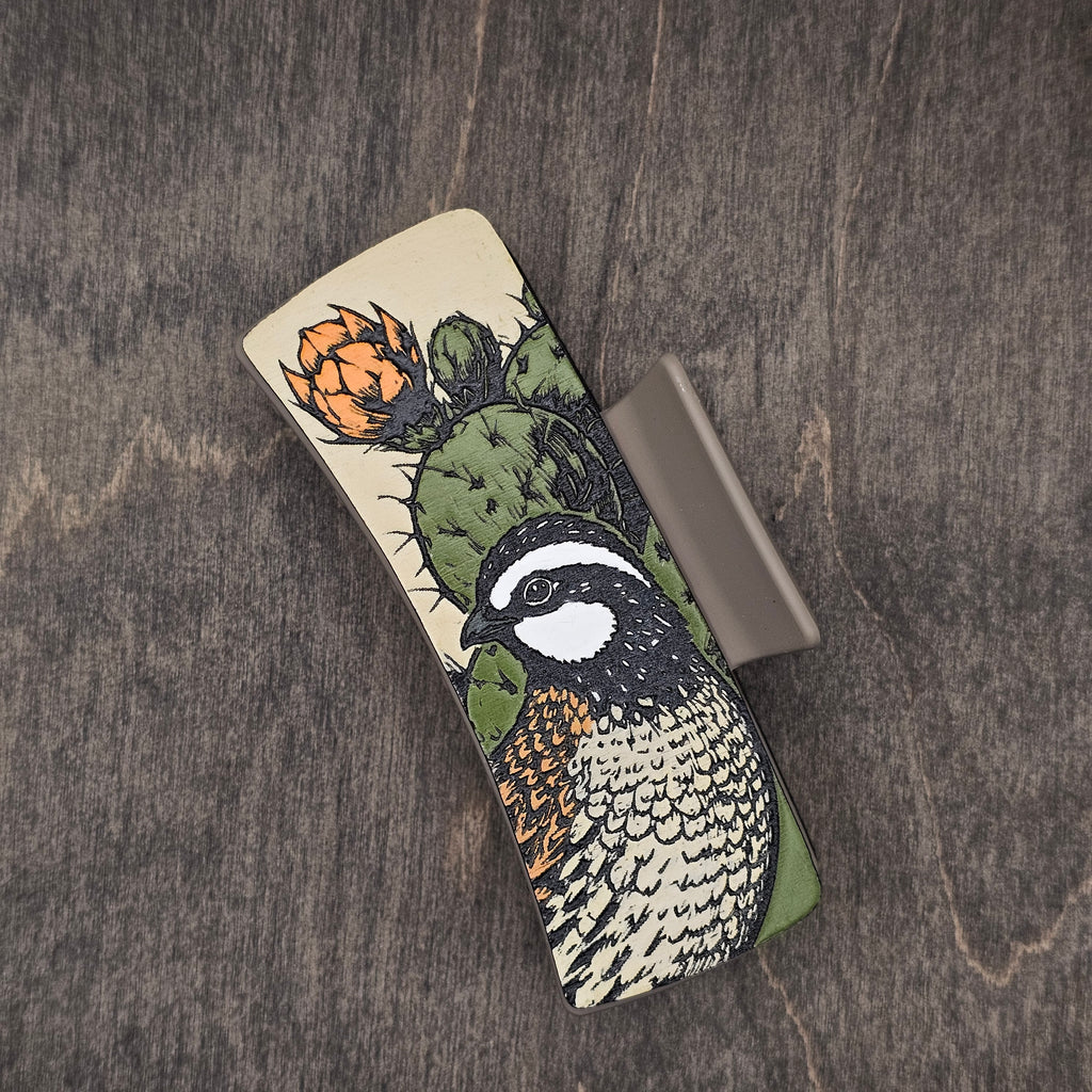 Hand-painted wood hair claw clip featuring a Northern Bobwhite quail and prickly pear cactus